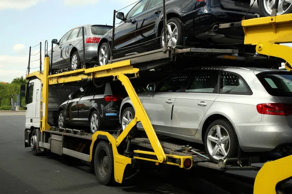 depositphotos 260290092 stock photo semitrailer transporting new cars
